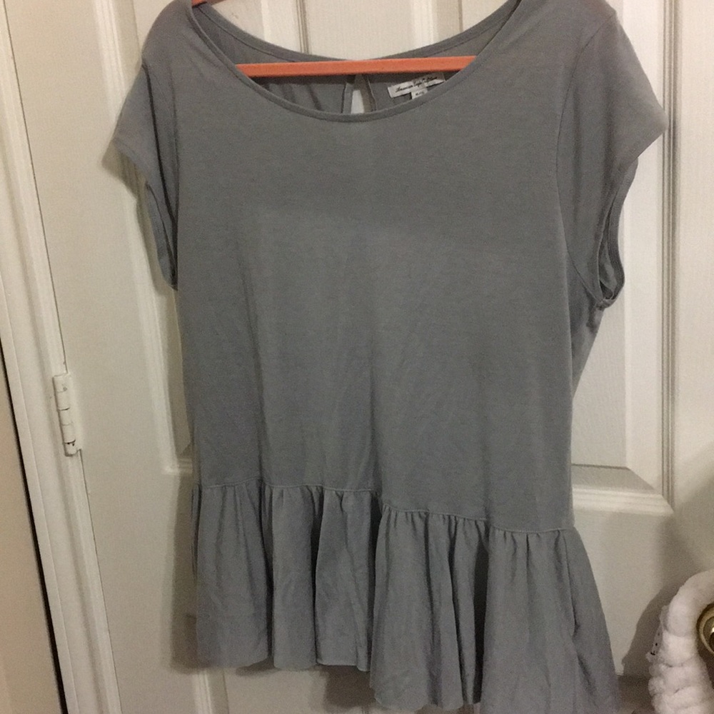 Peplum w/keyhole back